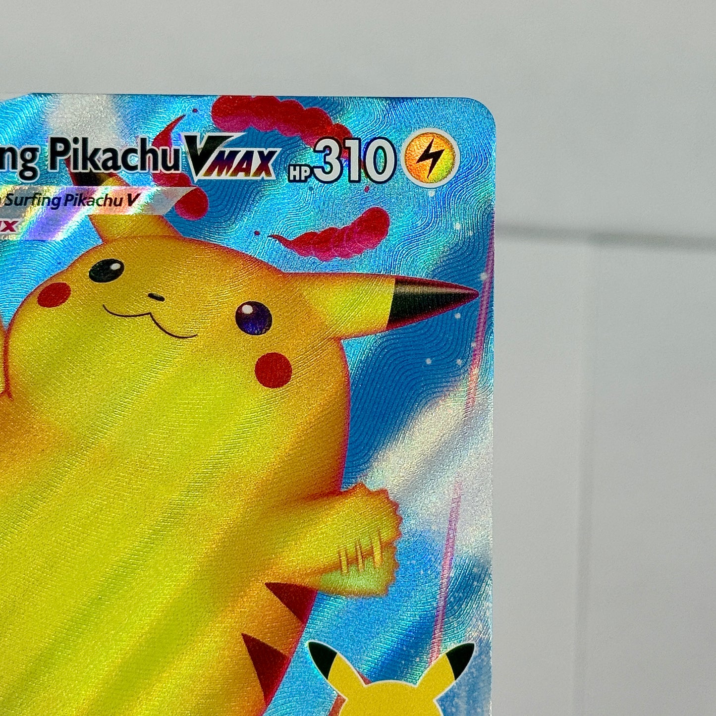 Surfing Pikachu VMAX 009/025